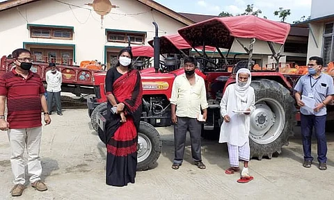 Deputy Commissioner Keerthi Jalli distributed tractors in Hailakandi