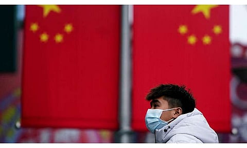 China's inflation eases but grew 3.3% in April