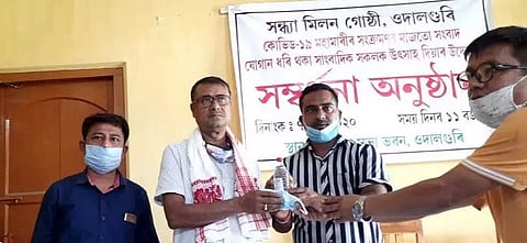 Sandhya Milan Gosthi distributes face masks and sanitizers in Udalguri