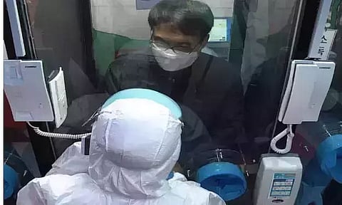 COVID-19: Laboratory technicians for isolation booths