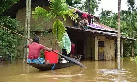 Assam flood scene: Brahmaputra flows above the danger level at Neamatighat