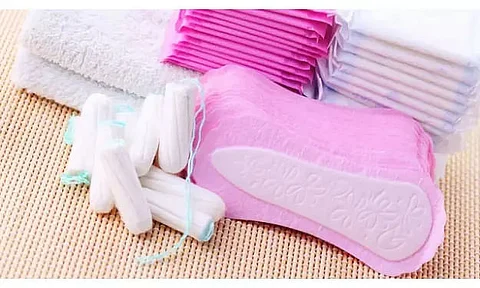 Sangini Saheli & IRS officers distribute sanitary napkins