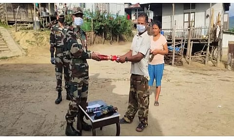 Assam Rifles distributes umbrellas in Mizoram