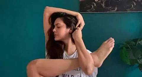 Esha Gupta performing yoga for Physical, mental & spiritual self