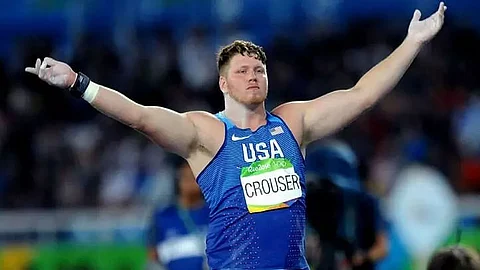 Olympic shot put champion Ryan Crouser throws new personal best with 22.91m