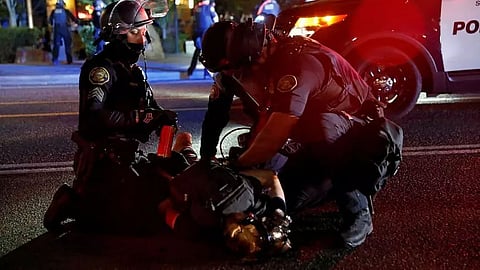 Supporters of Donald Trump clash with protesters