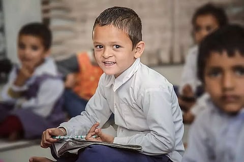 Deprived of education, slum kids receive classes from JNU students