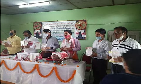 Book released by SP Dr Nandan Shing Borkola at Morigaon Press Club