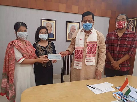 Assam students' body donates money for flood relief to CM Sonowal, lauded
