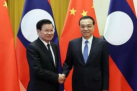 China and Laos to strengthen ties in economy, regional issues