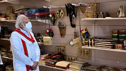 PM Modi in a handicraft stall at Ekta Mall