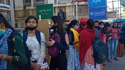 Girls students queue up to register for scooties