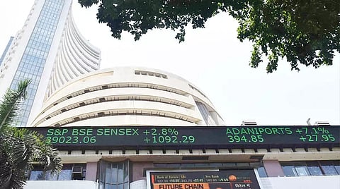 Sensex closes 282 points higher amid volatility