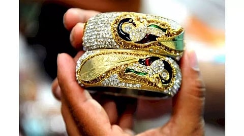 COVID vaccine hopes push gold below Rs 49,000 per 10 gram