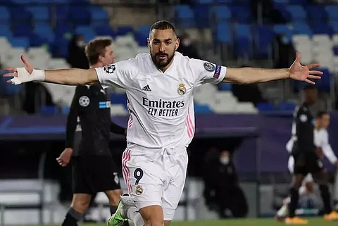 Karim Benzema double sends Real Madrid through; Inter out Champions League