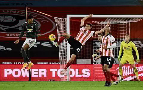 Manchester United fight back again to sink Blades