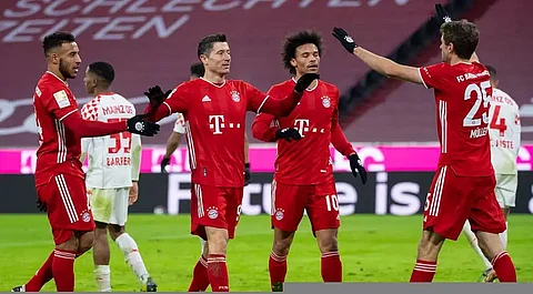 Bayern Munich retain top spot with comeback win over Mainz