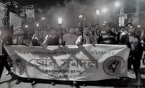 AASU takes out torchlight rally in Lakhimpur demanding repeal of CAA