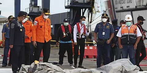 Human body parts retrieved from Indonesian plane crash site