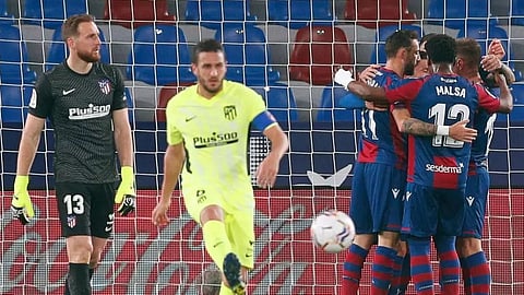 Atletico Madrid extend lead but drop points against Levante