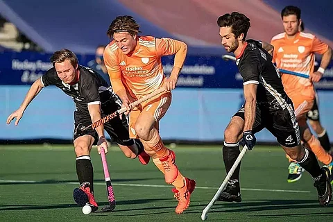 Double wins for Germany, Netherlands