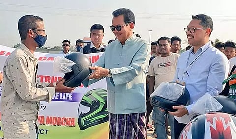 Arunachal Pradesh Deputy CM Chowna Mein distributes helmets at Namsai