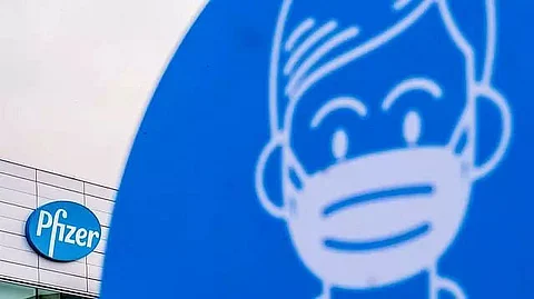Pfizer begins testing oral pill to treat COVID