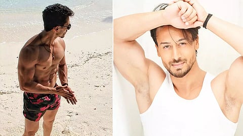 Bollywood action star Tiger Shroff goes shirtless on the beach