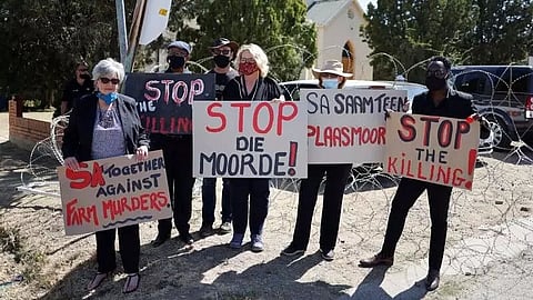 Cambodians demand apology after an Irish artist altered images of country's genocide victims