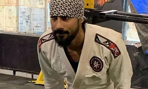 A global martial arts champion living in penury