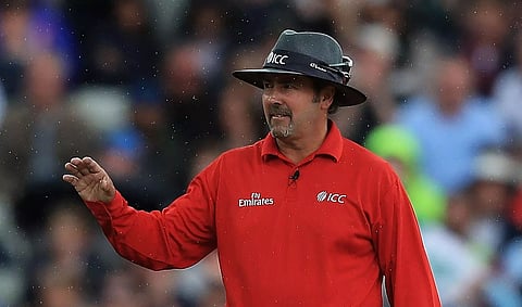 Umpire Richard Illingworth helps New Zealand