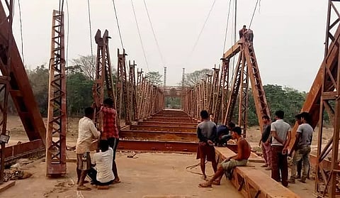 Kopili irrigating Rani on paper