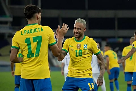 10-man Brazil sink Chile to secure semifinal spot