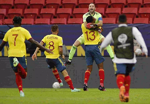 David Ospina stars as Colombia edge out Uruguay on penalties