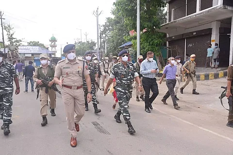 Flag march conducted in Golaghat; people urged to follow COVID rules
