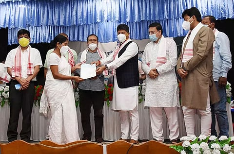 Minister Pijush Hazarika hands over cheques to 32 beneficiaries in Biswanath