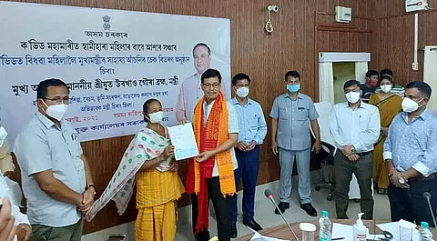 Minister UG Brahma distributes cheques to 13 widows in Chirang district