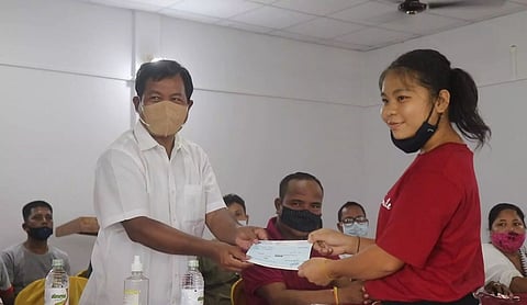 Scholarships to meritorious students in Dudhnoi