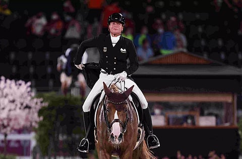 Powerhouse Germany retain dressage gold
