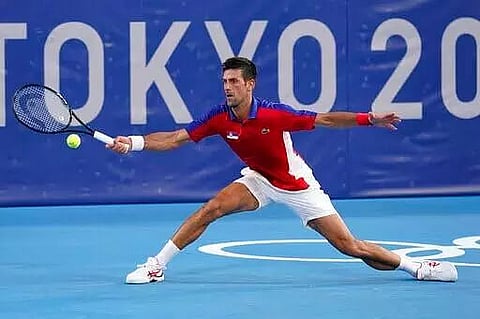 Novak Djokovic keeps going in Golden Slam bid