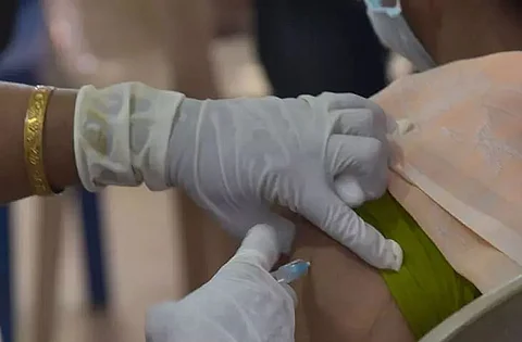 Anti-COVID vaccine drive held in a remote village at Jamugurihat