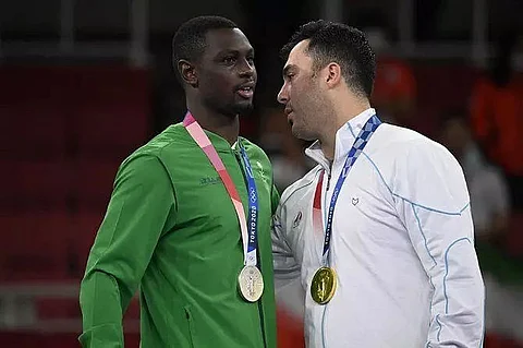 Sajad Ganjzadeh (L) from Iran