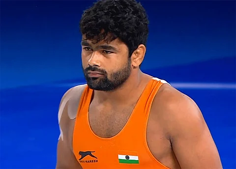 Wrestler Malik loses bronze play-off in just 42 seconds