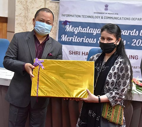 Laptops given to meritorious students at Yojana Bhavan Auditorium, Shillong