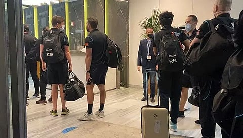 24 members of New Zealand squad return to Auckland