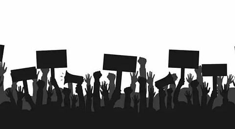 Moran students stage sit-in at Doomdooma Revenue Circle office