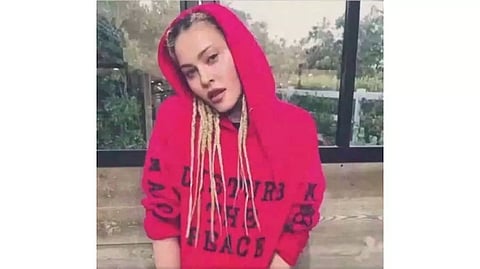 Madonna takes to Harlem street singing 'Like A Prayer'