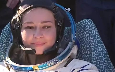 Russians return to Earth after filming first movie in space