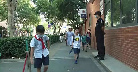 China passes law to check students' 'twin pressures'