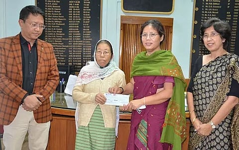 Cheque distributed to COVID-19 widow in Haflong